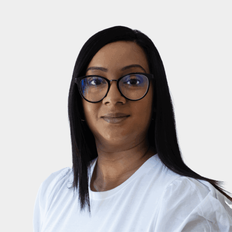 Elegant woman with glasses at Somashni Israel, highlighting advanced cosmetic and skincare services.